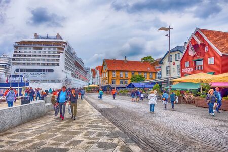 Stavanger, Norway - August 2, 2018: City street view with people, harbour and cruise ship MSC Magnificaのeditorial素材