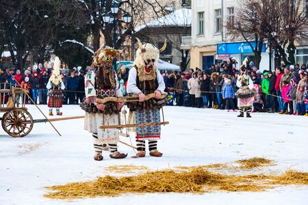 Razlog, Bulgaria - January 14, 2017: People in traditional carnival kuker costumes at Kukeri festival Starchevataのeditorial素材