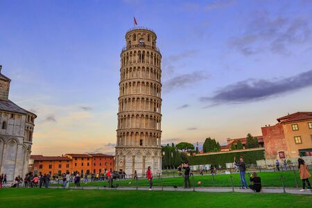Pisa, Italy - October 25, 2018: Leaning Tower of Pisa, Italy against blue sunset sky and people aroundのeditorial素材