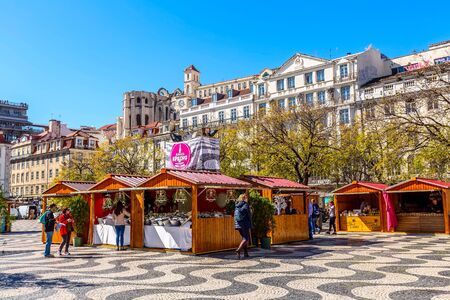 Lisbon, Portugal - March 27, 2018: Rossio square with spring Easter market and peopleのeditorial素材