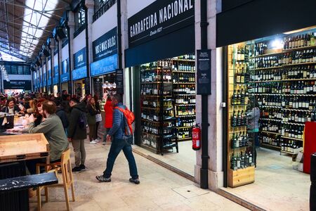 Lisbon, Portugal - March 29, 2018: People dining at Food Market Mercado da Ribeira, Time Out and...
