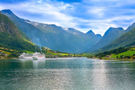 Olden, Norway - August 1, 2018: Norwegian fjord landscape and cruise ships in the portのeditorial素材