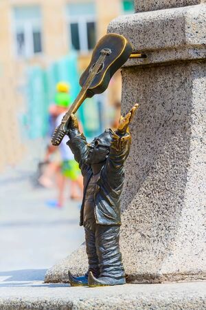 Wroclaw, Poland - June 21, 2019: Dwarf gnome with guitar in the old townのeditorial素材