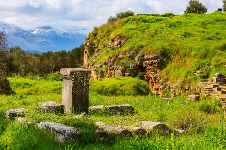 Sparta, Greece Ancient ruins remains in Peloponnese and snow mountain peaksの写真素材