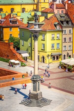 Warsaw, Poland - June 24, 2019: Aerial view of colorful houses and Sigismund column in Castle Square in the Old Town of polish capitalのeditorial素材