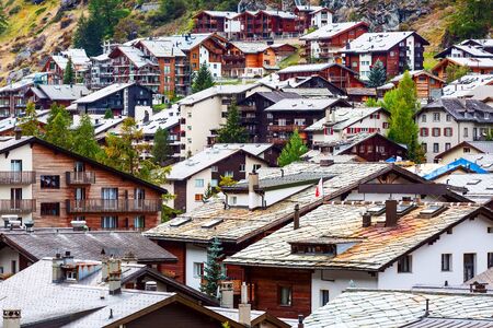 Zermatt, Switzerland town aerial view in famous swiss ski resort, colorful traditional housesの写真素材