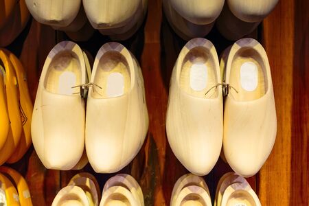 Many dutch traditional wooden shoes or clogs for sale in Holland, Netherlands