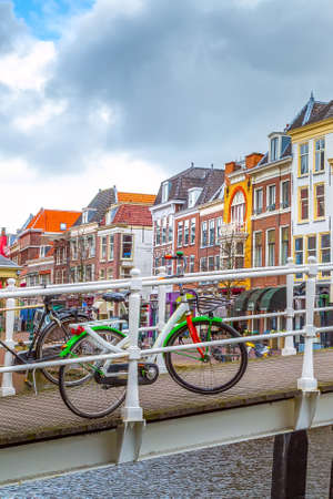 Leiden, Netherlands - April 7, 2016: Traditional houses, bridge and bicycles in downtown, Hollandのeditorial素材