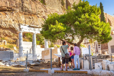 Athens, Greece - October 14, 2016: People on the road to Acropolis and old ruinsのeditorial素材