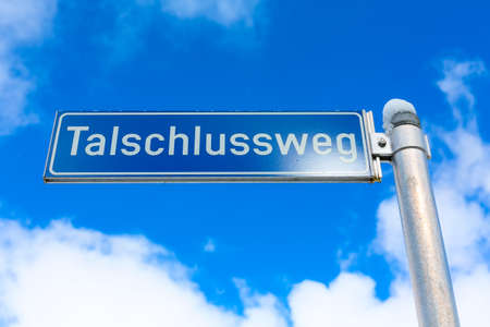 Saalbach-Hinterglemm, Austria - March 4, 2020: Directions sighpost arrows to Talschlussweg, bridge and adventure parkのeditorial素材