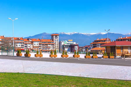 Bansko, Bulgaria - April 14, 2017: Bulgarian resort spring view with aldo, mountains peaks landscape and housesのeditorial素材