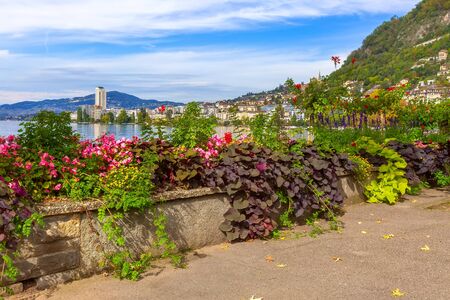 Panoramic view of Montreux promenade and Lake Geneva, Switzerland with flowers and treesの写真素材