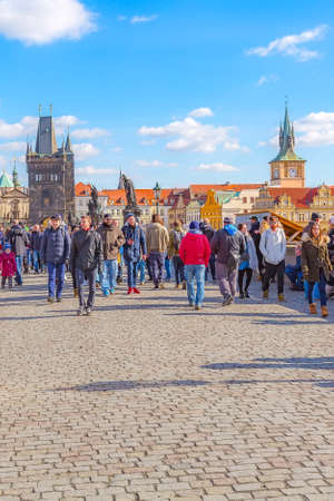 Prague, Czech Republic - February 25, 2017: People at Charles Bridge and historic buildings panoramaのeditorial素材