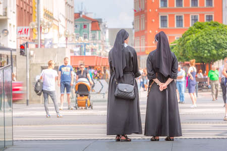 Wroclaw, Poland - June 21, 2019: Two nuns in downtown of famous Polish city Vroclavのeditorial素材