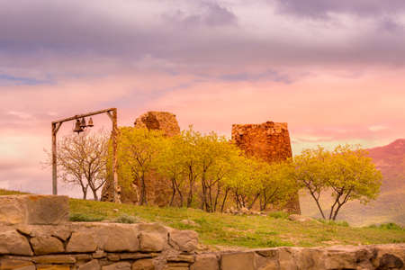 Mtskheta, Georgia, bells near Jvari Orthodox monastery on the hill during sunsetのeditorial素材