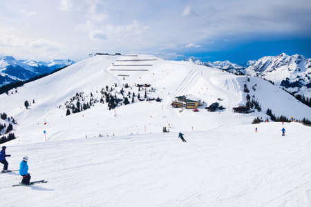 Saalbach, Austria - March 1, 2020: People skiing at ski slope of austrain winter resortのeditorial素材