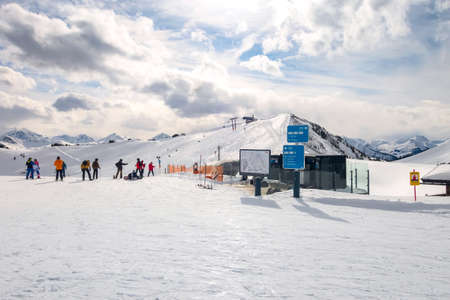 Saalbach, Austria - March 2, 2020: People skiing at ski slope of austrain winter resortのeditorial素材