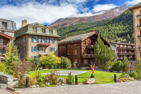 Zermatt, Switzerland - October 7, 2019: Houses decorated with flowers in alpine village, Swiss Alpsのeditorial素材