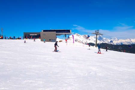Saalbach, Austria - March 2, 2020: People skiing at ski slope of austrain winter resortのeditorial素材