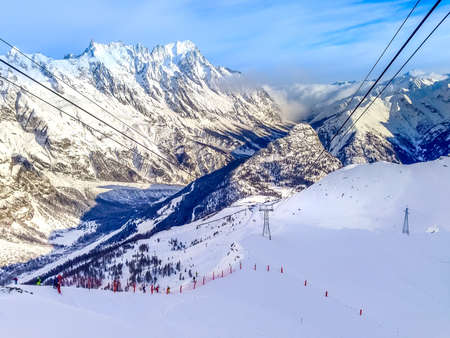 Courmayeur ski resort, Italy, Val dAosta aerial panorama with slope and Alps mountain peaksの写真素材