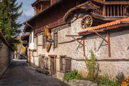 Bansko, Bulgaria - October 31, 2020: Autumn street view in downtown, old traditional bulgarian house, mehana Dedo Peneのeditorial素材