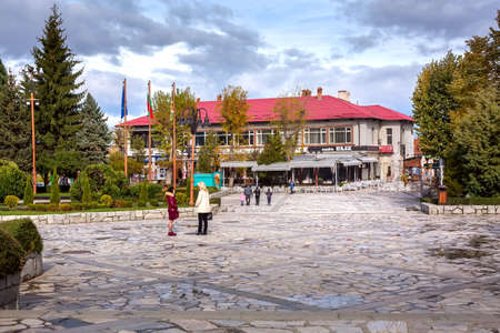 Bansko, Bulgaria - October 31, 2020: Autumn street view at Nikola Vaptsarov squareのeditorial素材