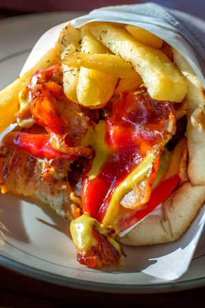 Greek gyros wrapped in pita bread