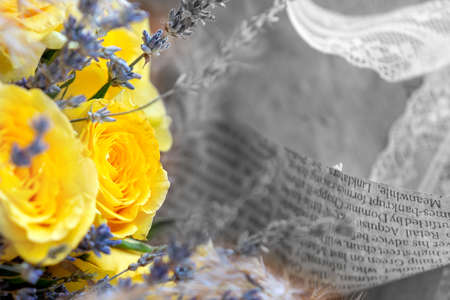 Still life of yellow roses and lavender bouquet flower on black and white, color cardの写真素材