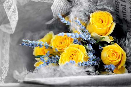 Still life of yellow roses and lavender bouquet flower on black and white, color cardの写真素材