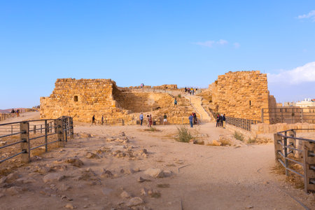Al Karak, Jordan - November 4, 2022: Medieval Crusaders Castle in the center of the city and tourists in Kerakのeditorial素材