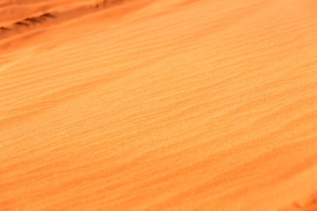 Golden orange desert sand texture background, Wadi Rum, Jordanの写真素材