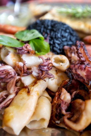 Roasted Mixed Seafood plate with Calamari Squids, prawns and Grilled octopus, Mediterraneanの写真素材