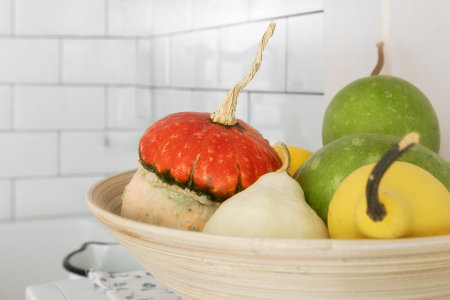 fruit and vegetable bowl, pumpkin and pears in the bowl, kitchen decor backgroundの写真素材