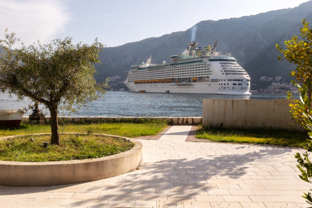 Kotor, Montenegro - September 20, 2023: Kotor Bay and Explorer of the Seas, Royal Caribbean cruise shipのeditorial素材
