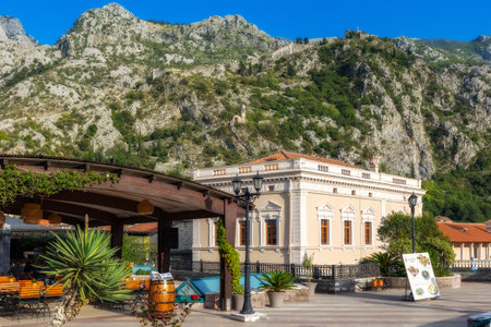 Kotor, Montenegro - September 20, 2023: Summer street view with houses and mountainsのeditorial素材