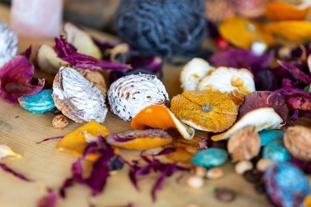 Roll of blue yarn thread for crafting lying on wooden table. Hobbies and craft materials theme.の写真素材