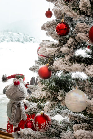Figurine of cute Christmas Reindeer and pine treeの写真素材