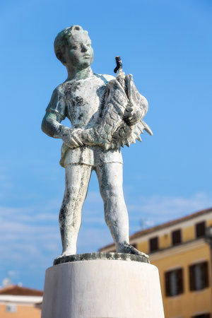 Rovinj, Croatia Boy with Fish fountain statueの写真素材