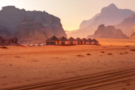 Camp site tents at Wadi Rum Desert, Jordan and red rocks landscapeの写真素材