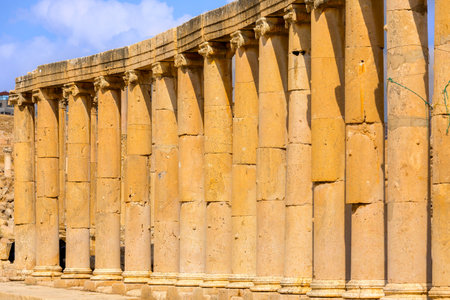Jerash, Jordan. Square with row of Corinthian columns of Oval Forum Plaza at archaeological site, ruins of Greek and Roman periodの写真素材