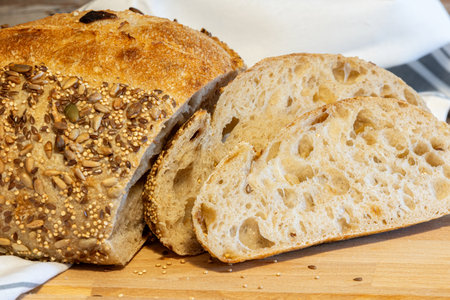 Homemade bread, sourdough wheat loaf with seedsの写真素材