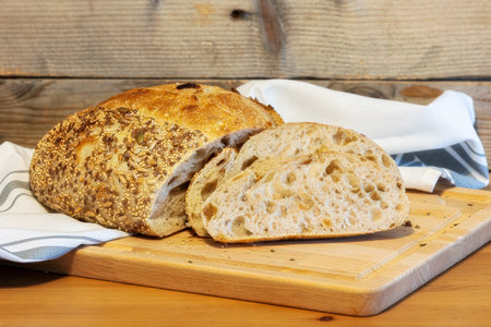 Homemade bread, sourdough wheat loaf with seedsの写真素材