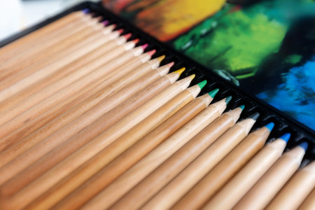 Set of colorful pencils for artists in a row metal boxの写真素材