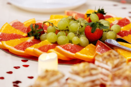 Fresh fruit platter with citrus, grapes and strawberriesの写真素材