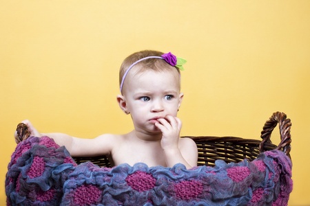 little girl in a basketの写真素材