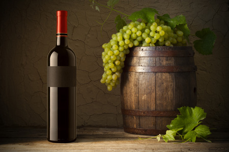 Wine glass on vineyard backgroundの写真素材