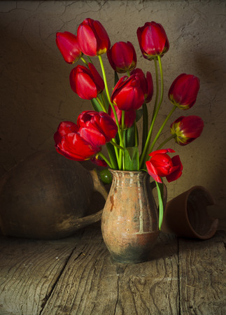still life with tulips and cherry blossomの写真素材