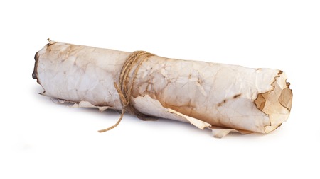 old parchment paper scroll isolated on white backgroundの写真素材