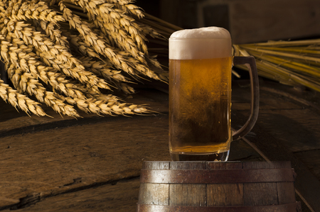 Still Life with a keg of beer and draft beer by the glass.の写真素材
