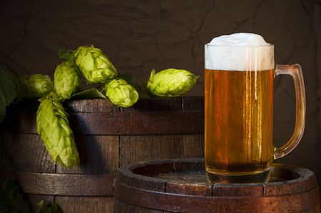 Still Life with a keg of beer and draft beer by the glass.の写真素材